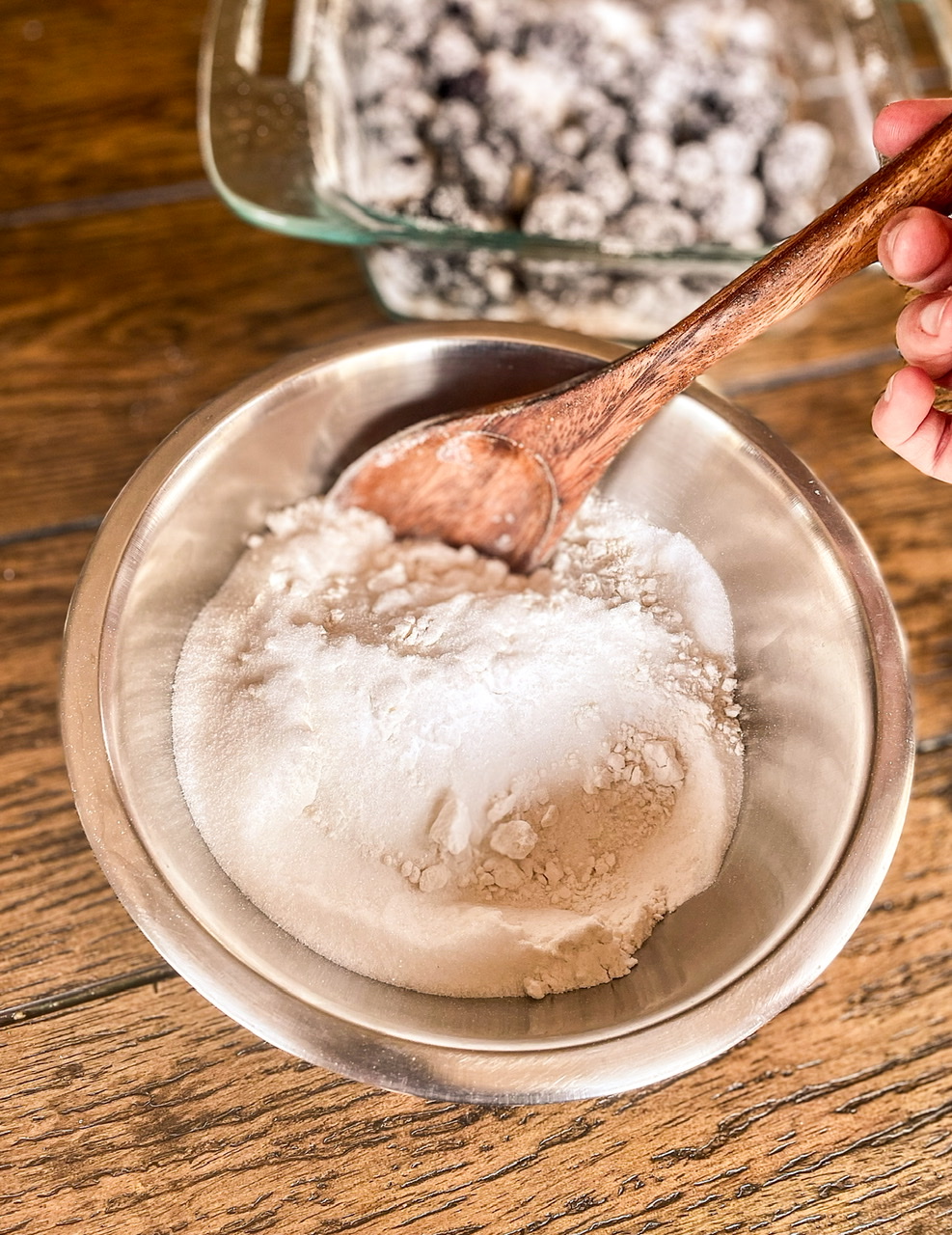 mixing blackberry cobbler dry ingredients