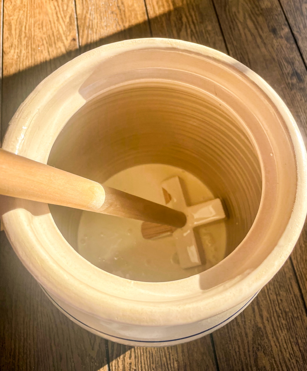 Heavy Whipping Cream in a Plunger Butter Churn