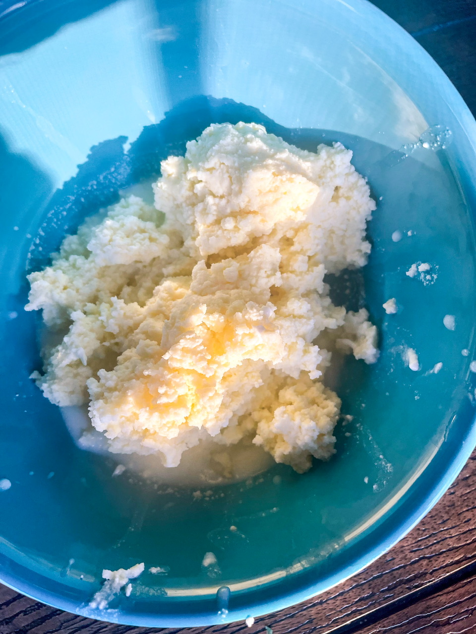 Homemade butter in a blue bowl
