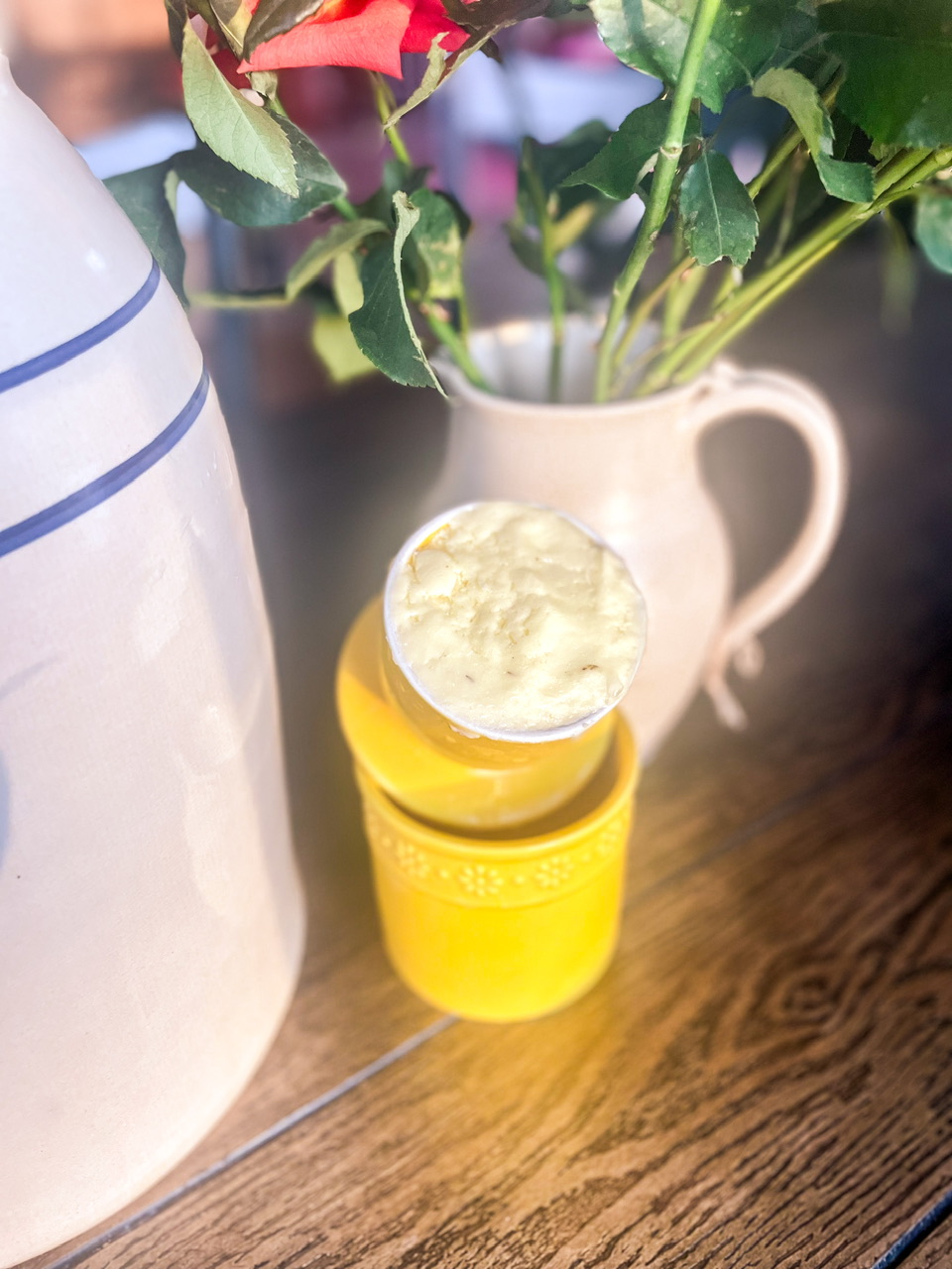 Homemade butter in a yellow butter crock